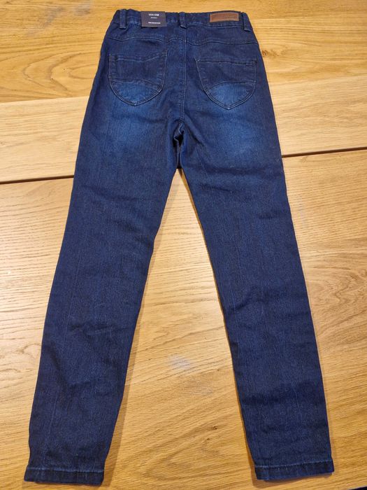 Dwie pary spodni jeans 134 cm