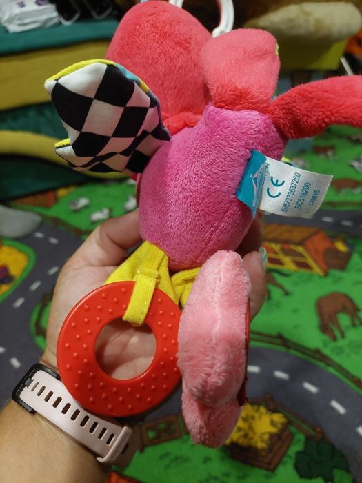 Іграшка на коляску