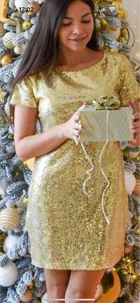 Платье из пайеток золотого цвета