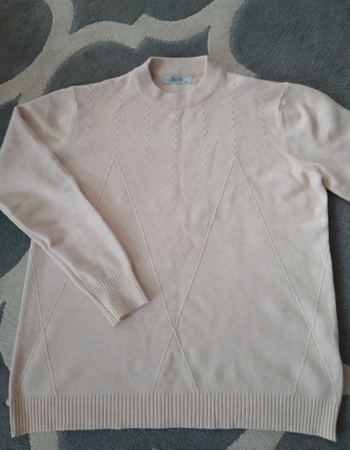 Sweter damski w kolorze jasno kremow