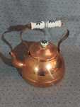 Chaleiras antigas em cobre