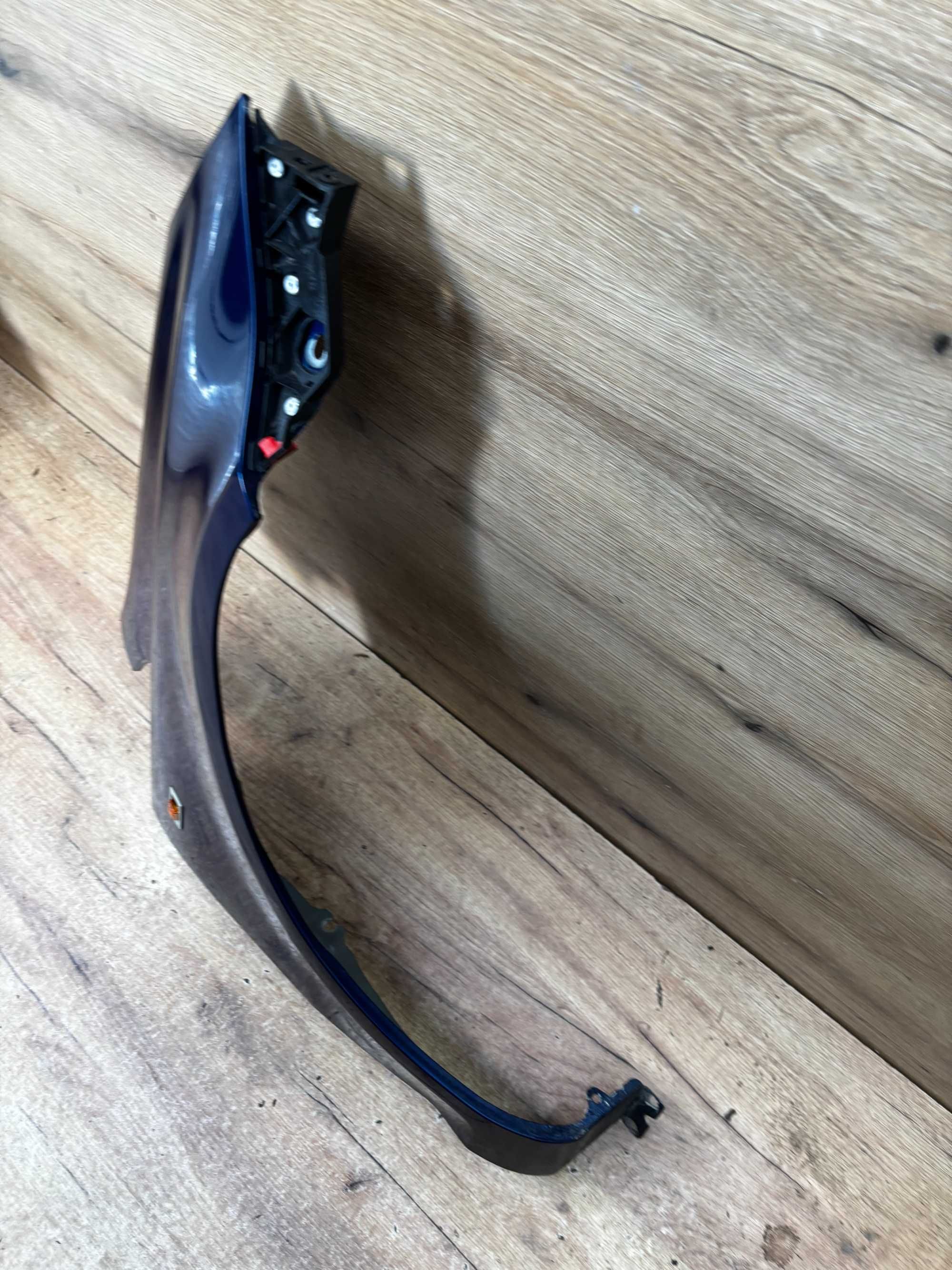 Błotnik przedni prawy Opel Corsa D kolor z21b