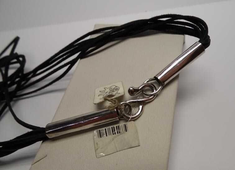 Autorski naszyjnik bursztyn rzemienie srebrne zapięcie.