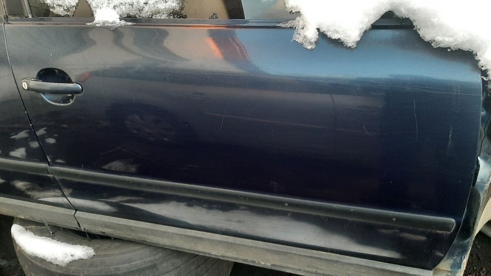 Двері пасат в5 з вікнами