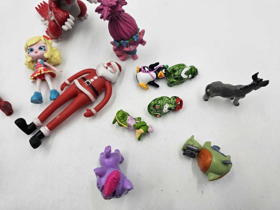 Zestaw mini zabawek figurki Flintstonowie Fifi Niezapominajka i inne