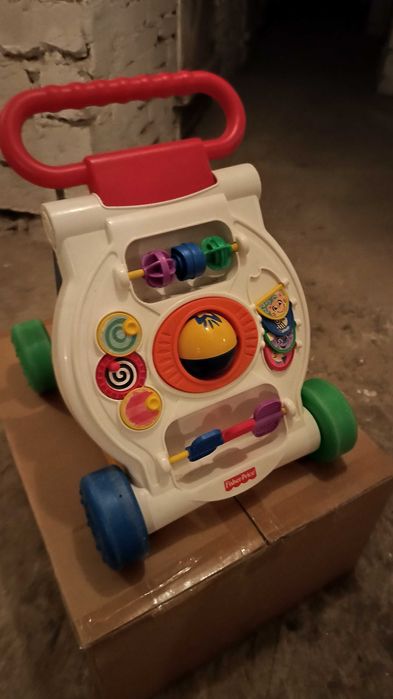 Chodzik , pchacz dla dziecka Fisher Price
