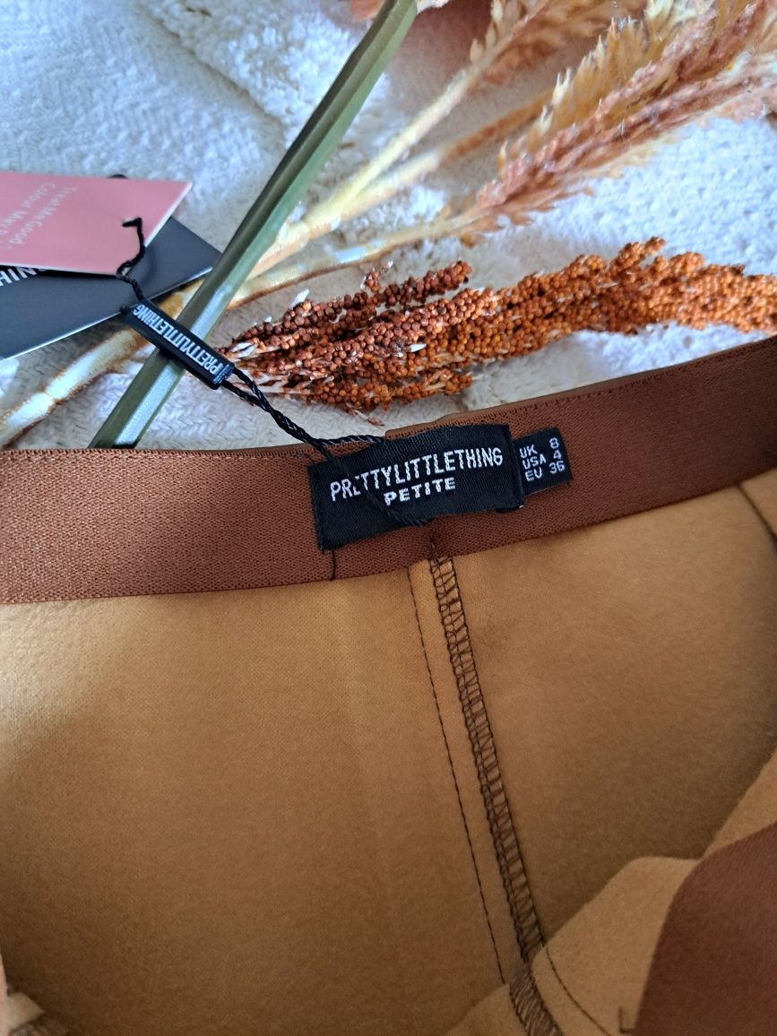 Piękne skórzane spodnie, jegginsy brązowe, rurki PrettyLittleThing 36