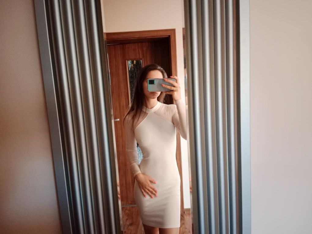 Biała sukienka z siateczką
