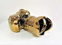 Máquina fotográfica em dourado para decoração