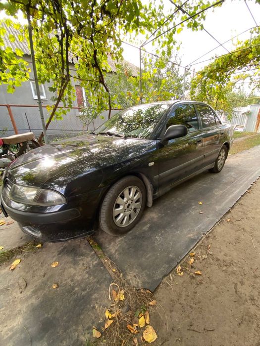 Mitsubishi Carisma 1.8 GDI, 2003 рік