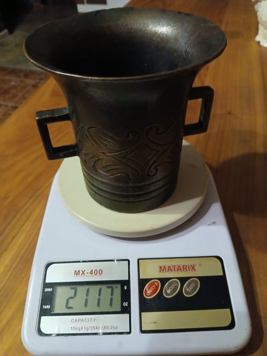 Мідна ступка з пестиком.