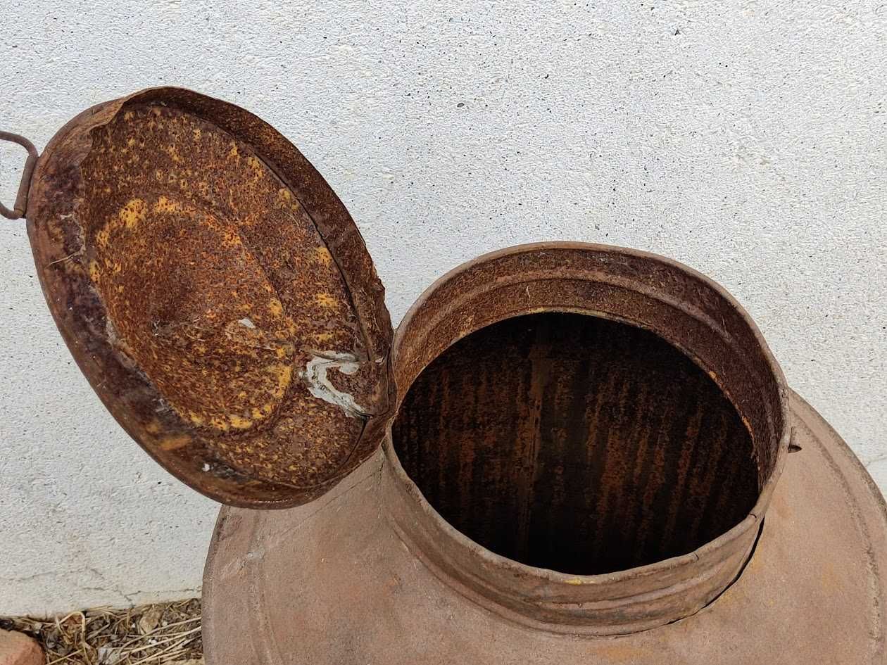 Talha decorativa antiga de azeite em metal