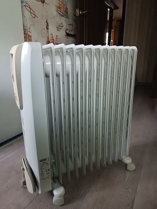 Масляный обогреватель Delonghi