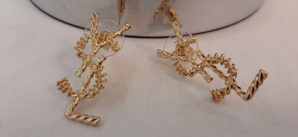 Duże, pozłacane kolczyki ysl model Opyum Cudo lv cc