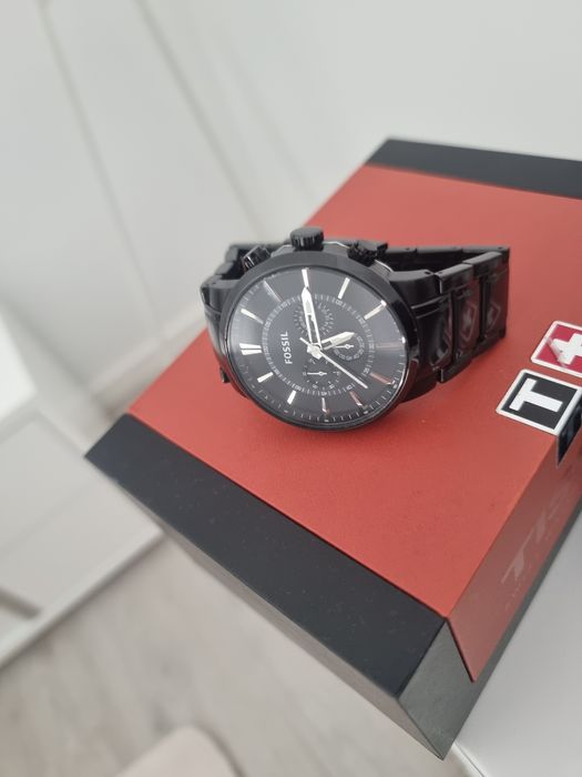 Relógio fossil e timberland