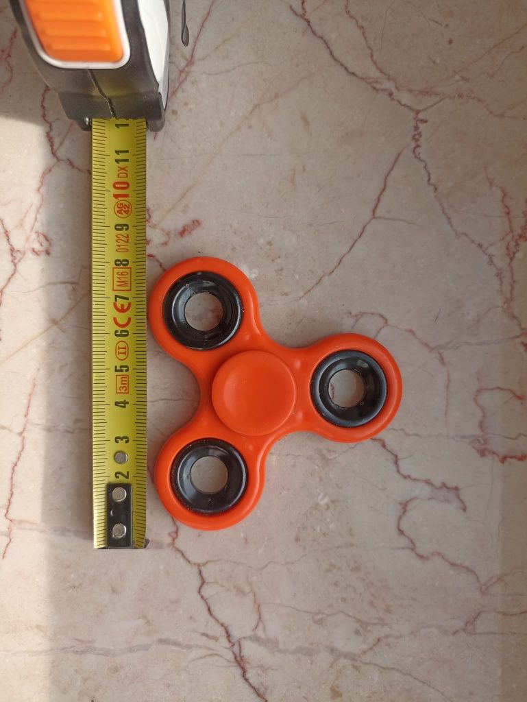 Fidget spinner spinner
