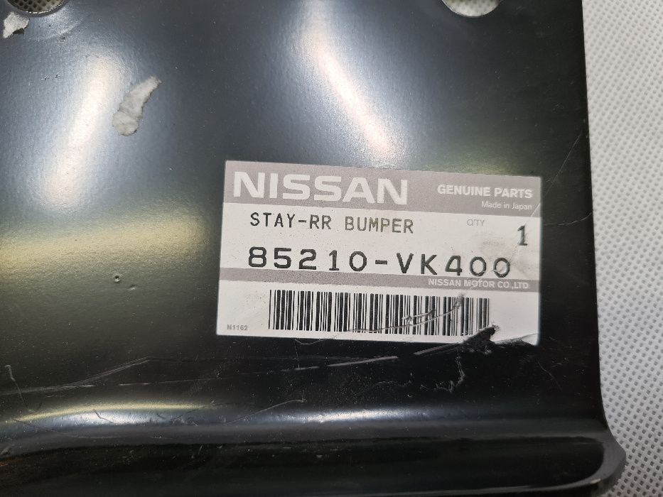 Mocowanie zderzaka tył prawe ślizg Nissan King Cab Navara OEM NOWE