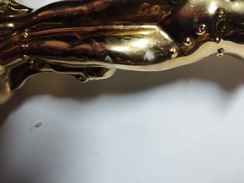 Подсвечник покрыт позолота.