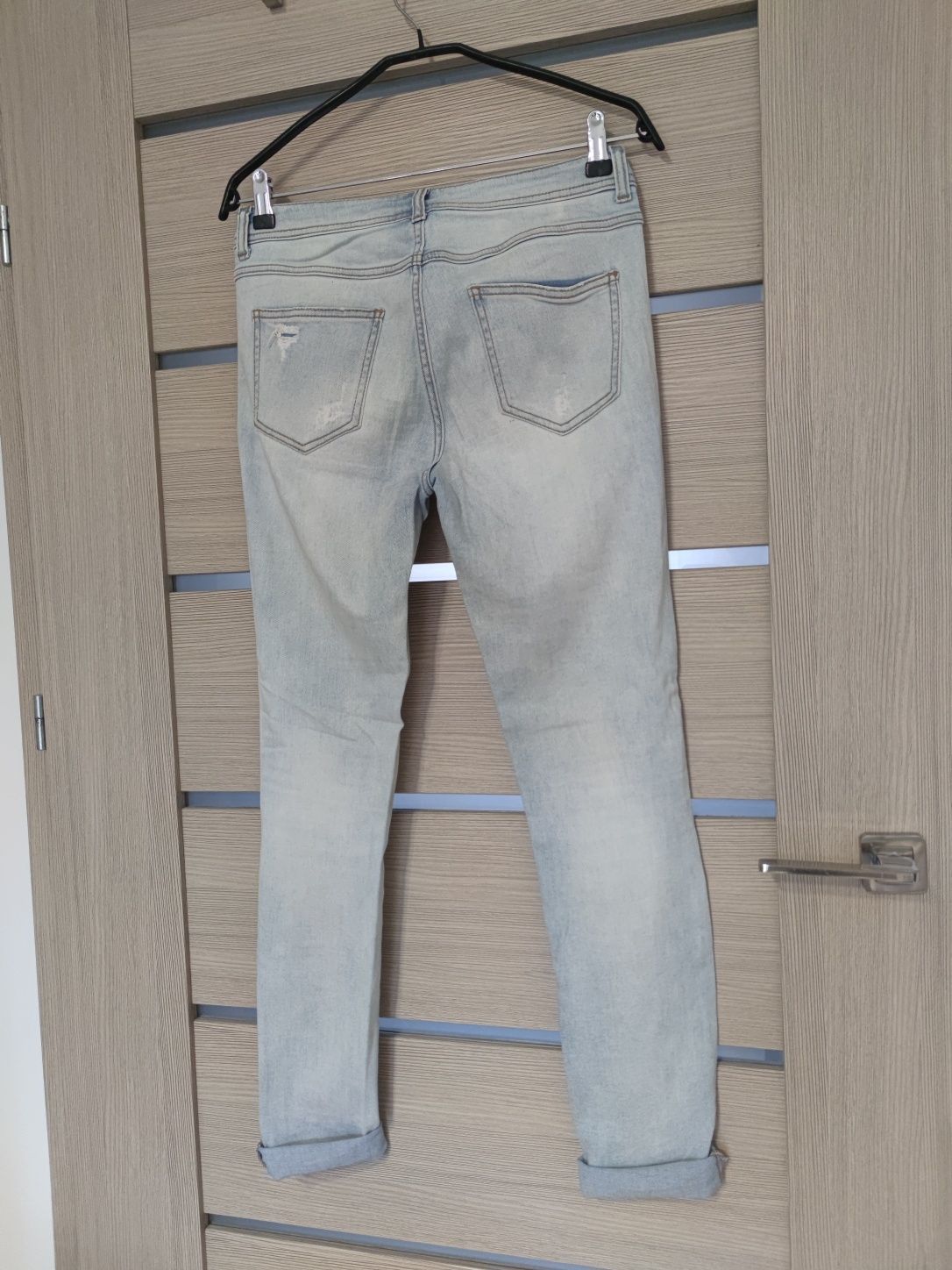 Jasne jeansy spodnie dżinsowe SLIM wysoki stan 38 M Reserved