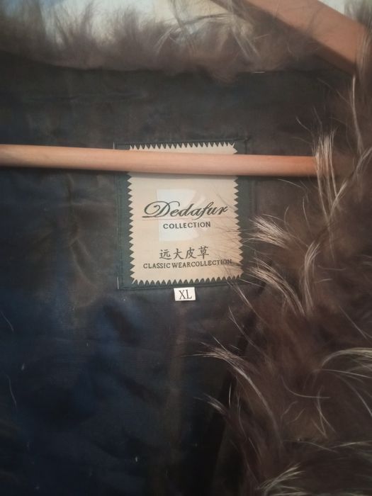 Продам жилетку женскую меховую.