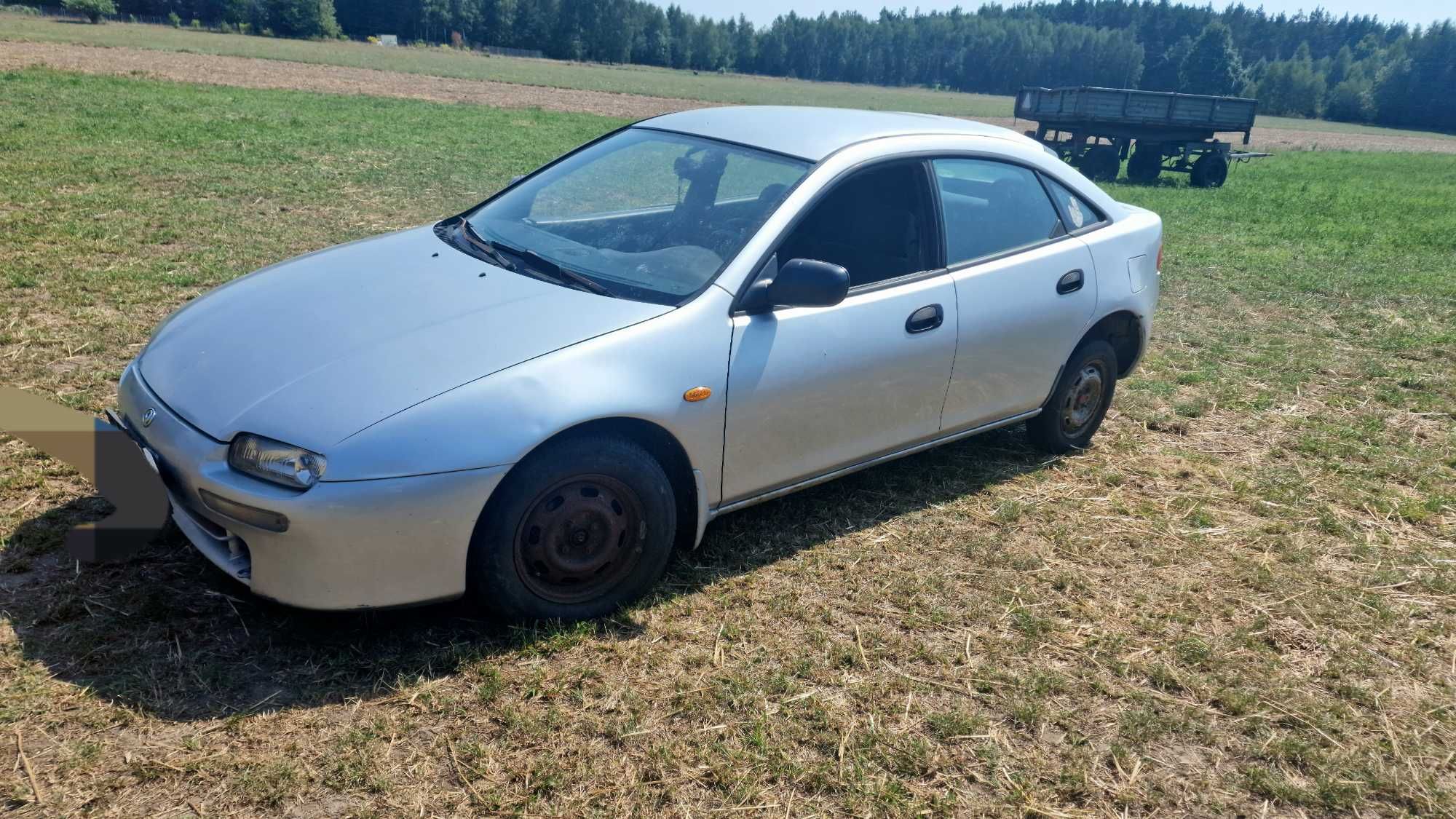 Drzwi przednie lewe mazda 323f 96r cała na części maska,klapa 1.5