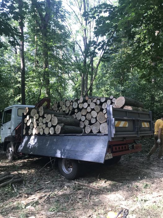 Мерседес самосвал маніпулятор доставки дрова