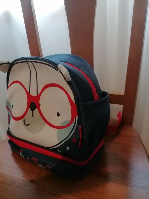 Mochila Tuc Tuc azul e vermelha