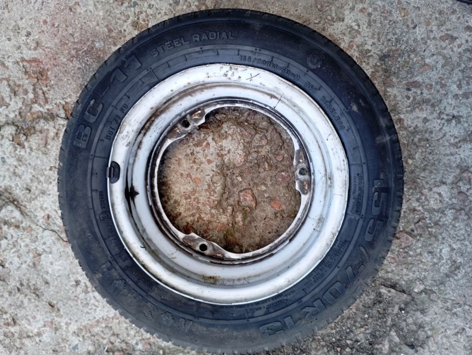 Шина с диском на славута таврия