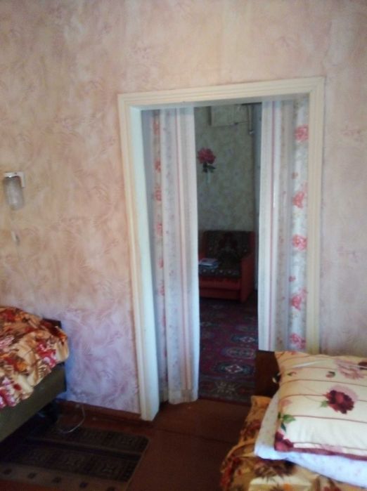 Продам половину будинка в районі Першої міської лікарні