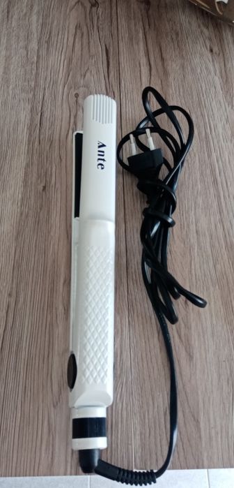 Prancha cabelo como Nova