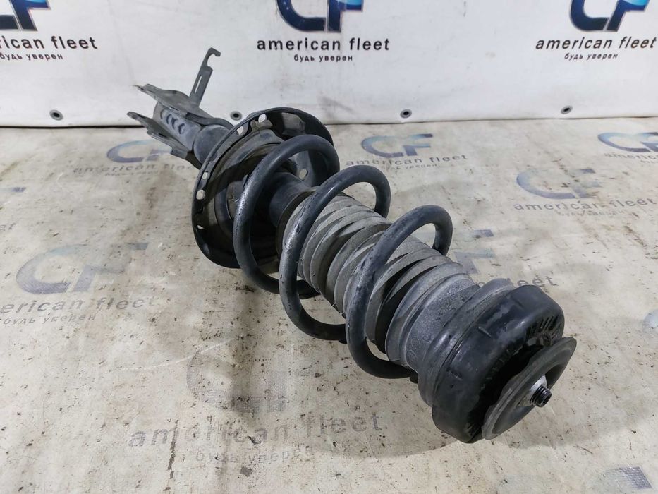 Chevrolet Cruze 11-15 Стойка амортизатора передняя левая / правая