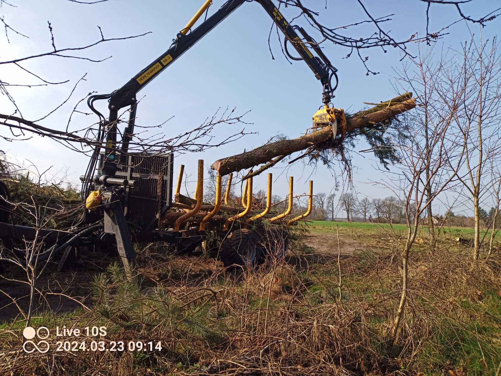 Koparko ładowarka  glebogryzarka separacyjna wycinki drzew transport .