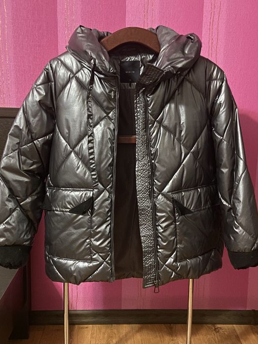 Жіночій стьогана куртка