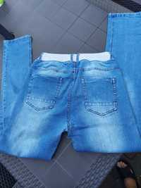 Młodzieżowe chłopięce jeansy jogger rozmiar M/L