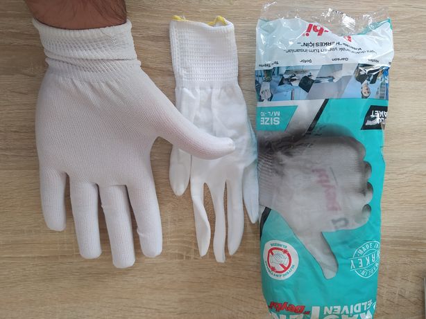 Одноразові рукавички білого кольору