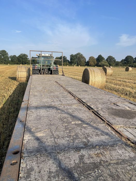 Przyczepa platforma dlużyca 4 osiowa do słomy balotów