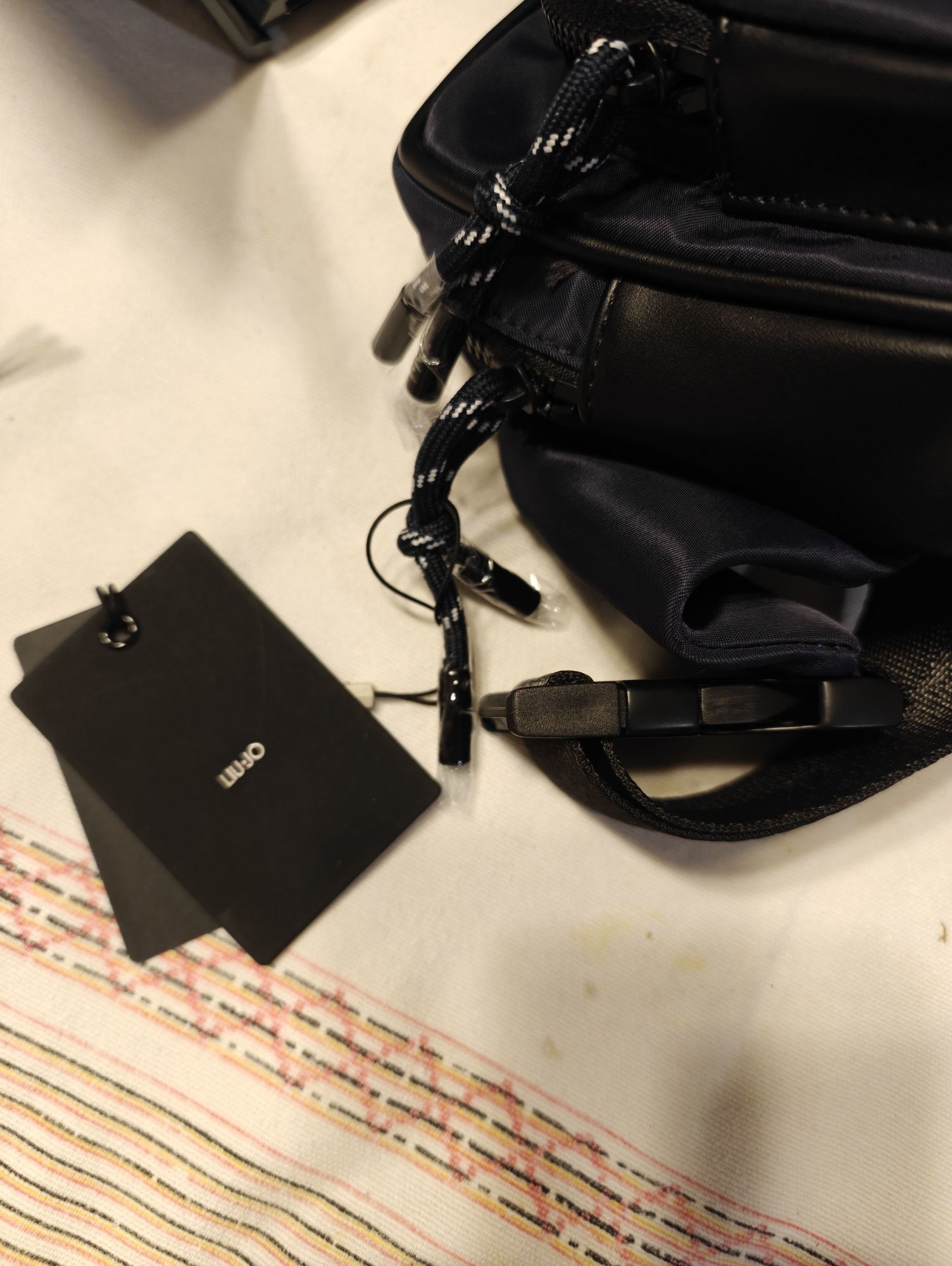 Bolsa cintura nova, na embalagem