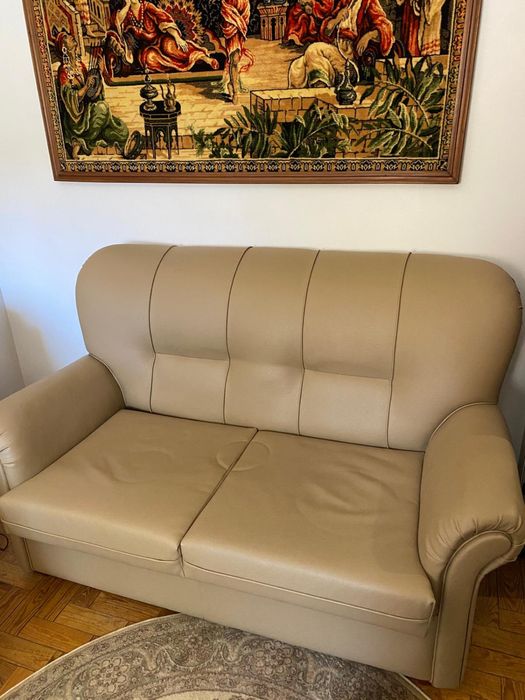 Sofas cremes de pele como novos