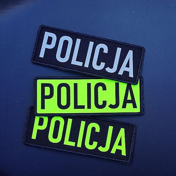 Emblemat dowolny nadruk ODBLASK czarne tło na COMBAT na rzepie 11 x 4