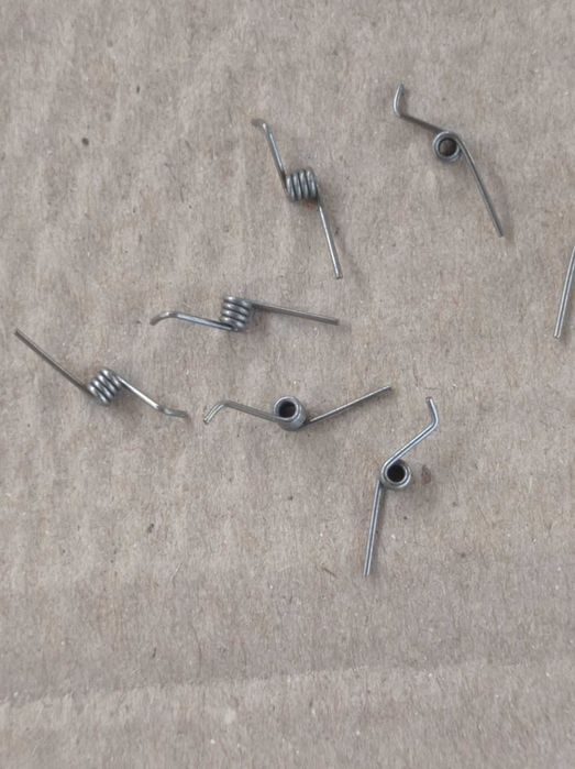 Пружина кручения  для зажима