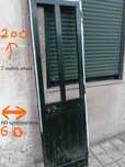 porta de  aluminio  verde sem vidros com fechadura