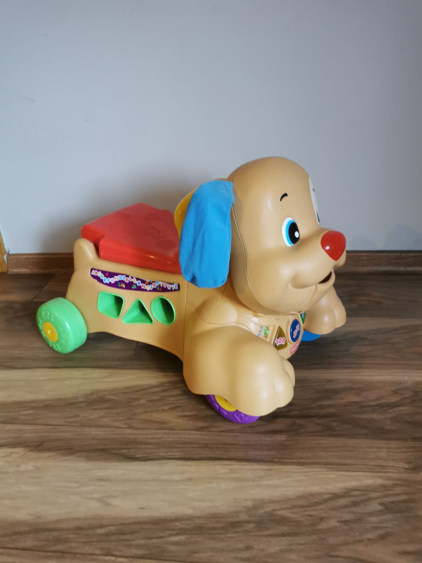 Piesek pchacz Fisher Price