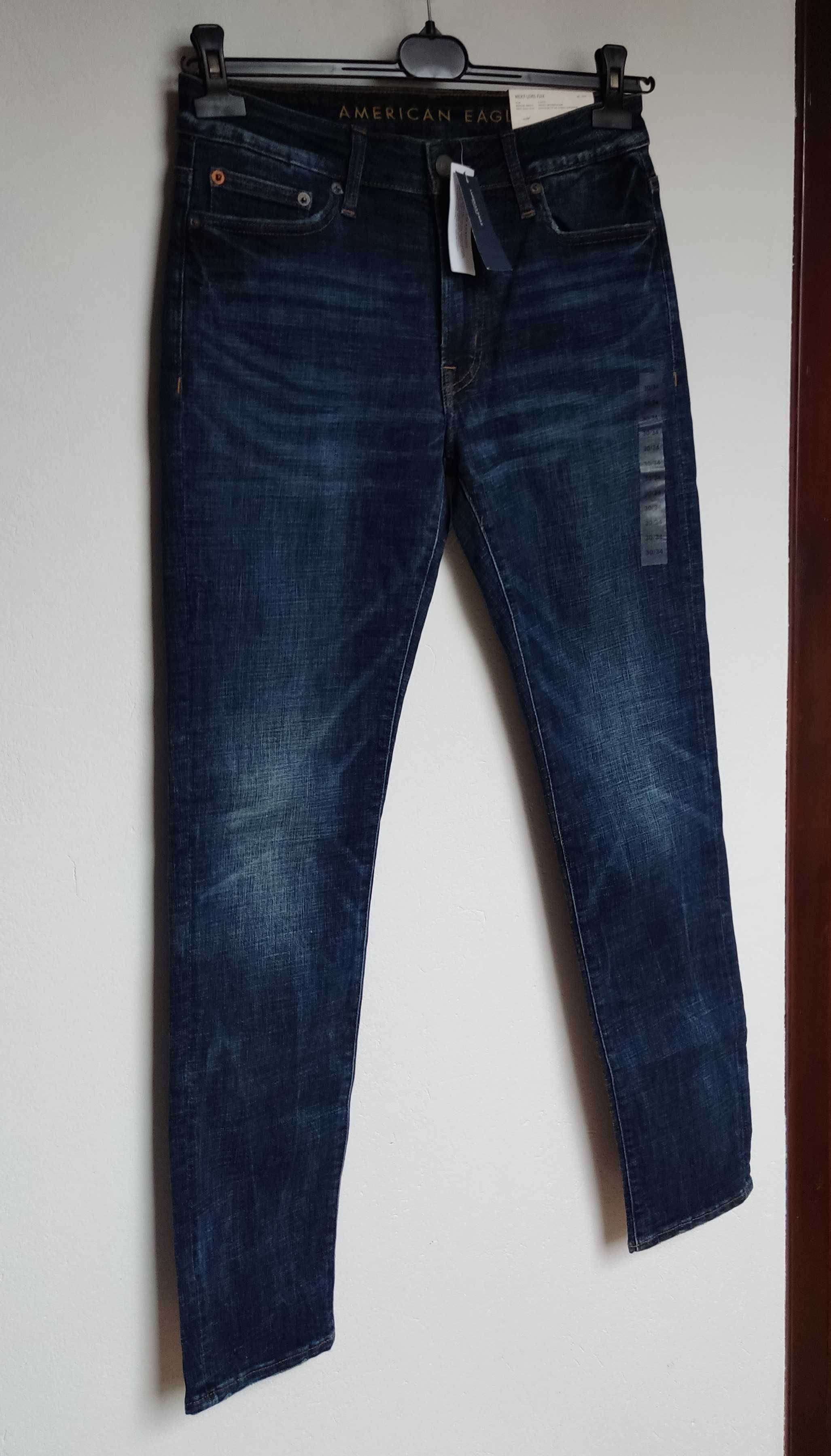 Spodnie jeansowe dżinsy męskie młodzieżowe granatowe nowe 30/34