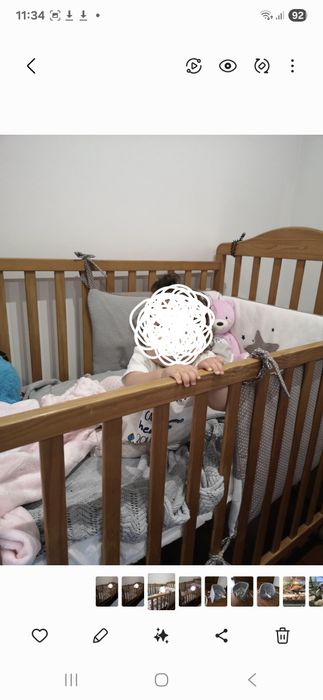 Cama de bebé de madeira