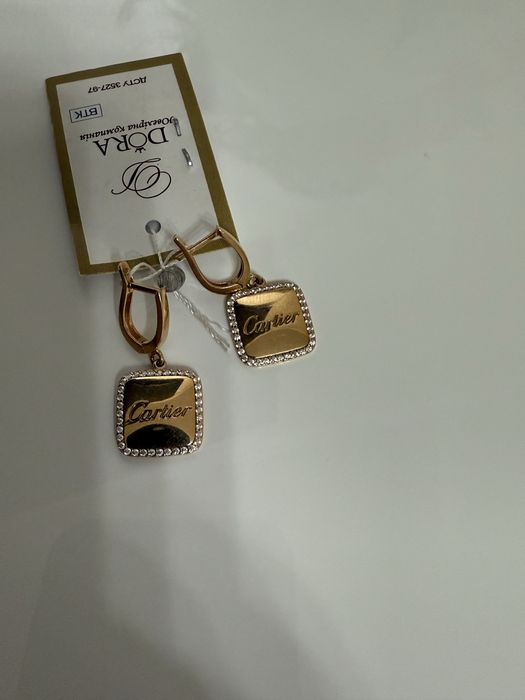 Золоті сережки Cartier