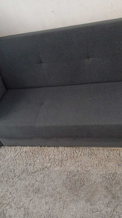 O sofá c/ arrumador