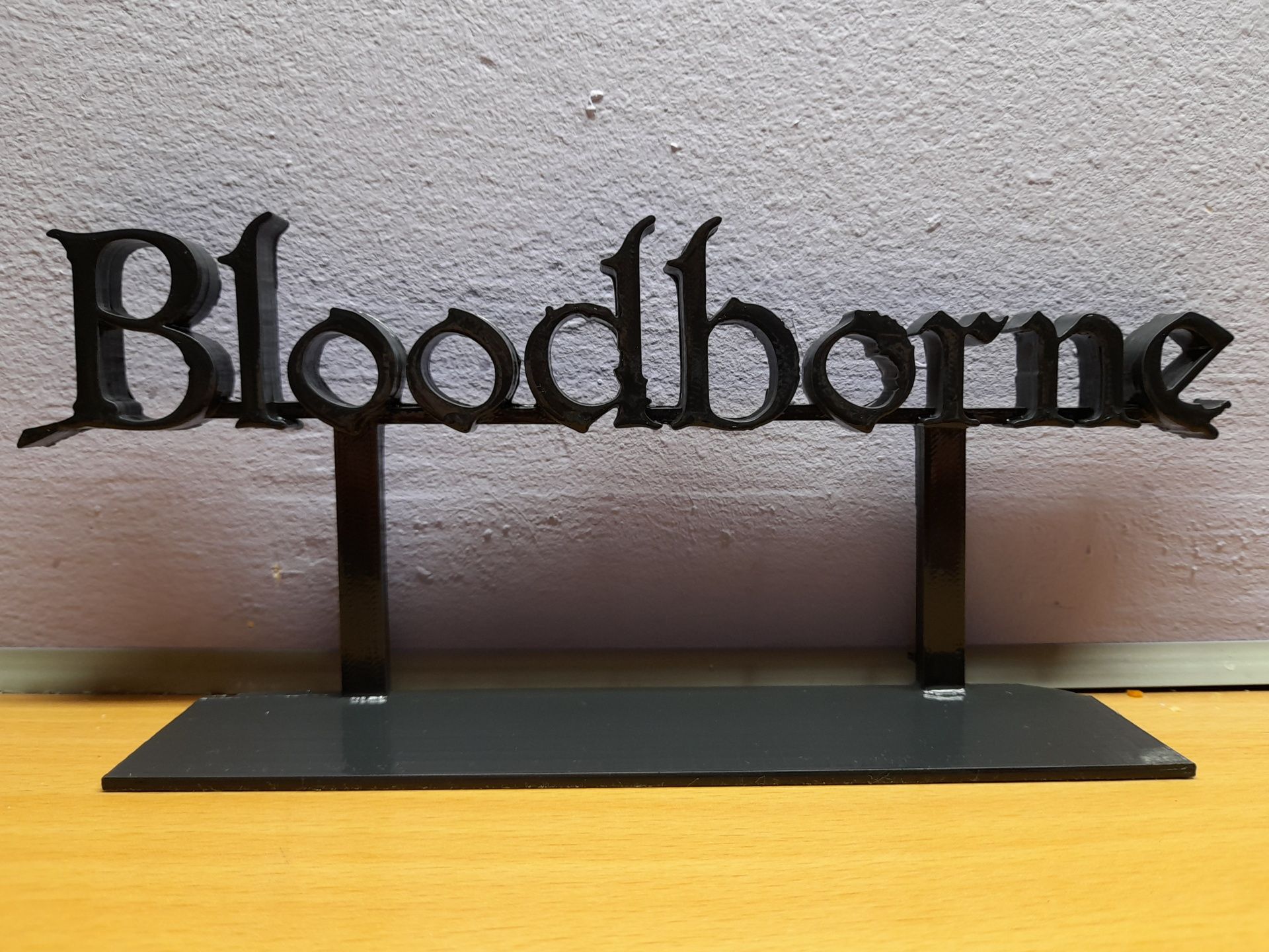 Bloodborne logo 24cm z podkładką