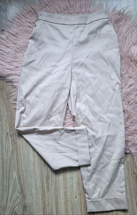Spodnie materiałowe beżowe Reserved szerokie wysoki stan na gumce 36