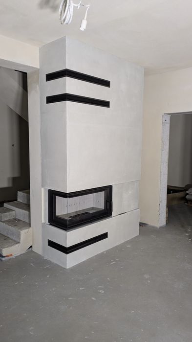 Nowoczesny kominek do rekuperacji z zabudową.