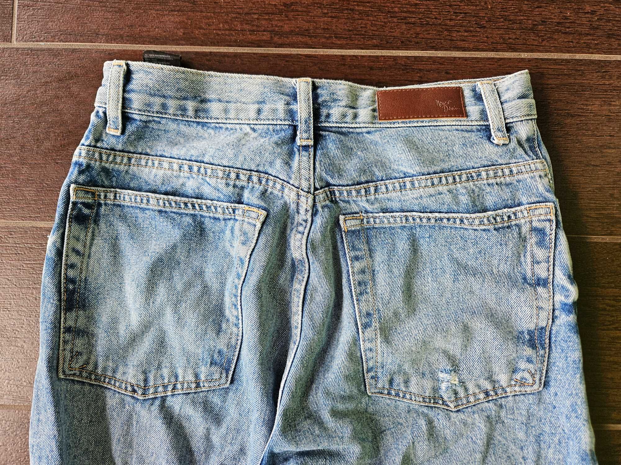 Niebieskie poprzecierane jeansy damskie, proste, Never Denim, rozm. 27